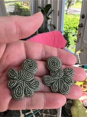 Rare vintage J Crew Sage
Green beaded stud earrings with leather backs.